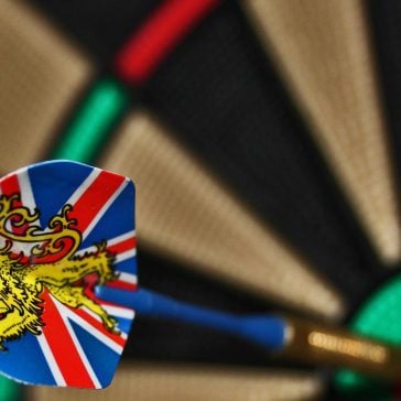 Dart with union flag hitting bullseye