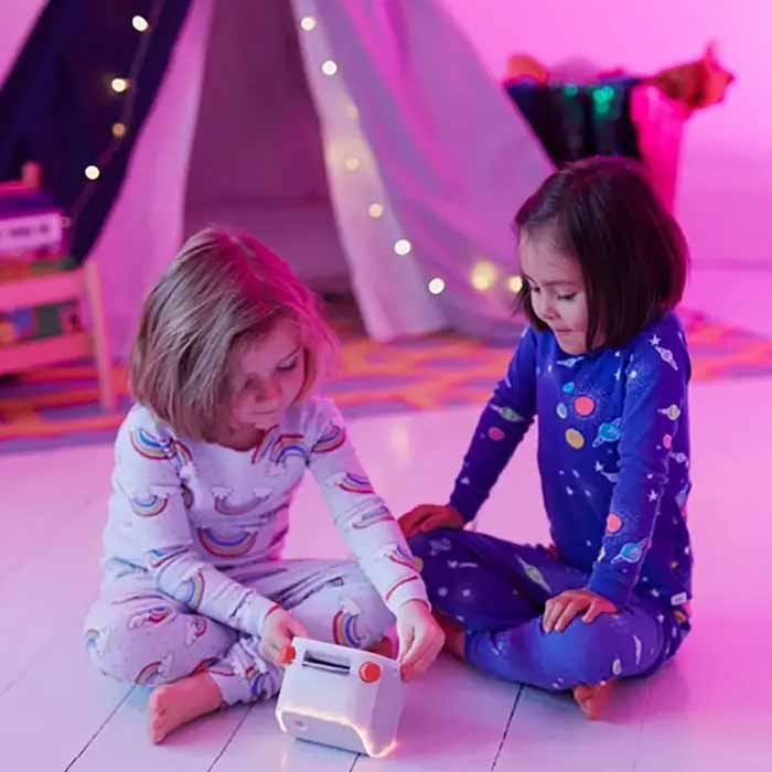 Girls playing with a toy