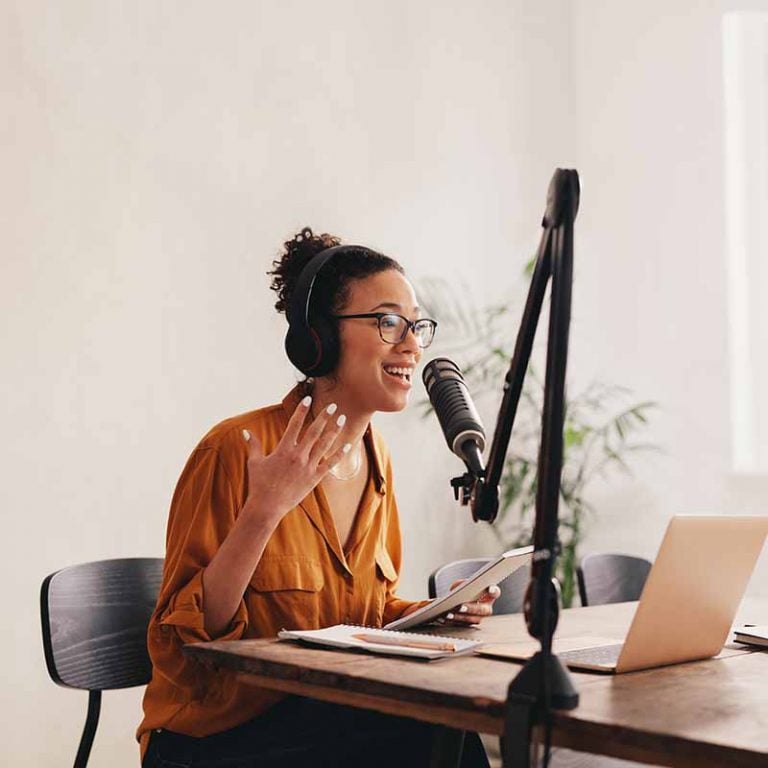 Woman recording a podcast