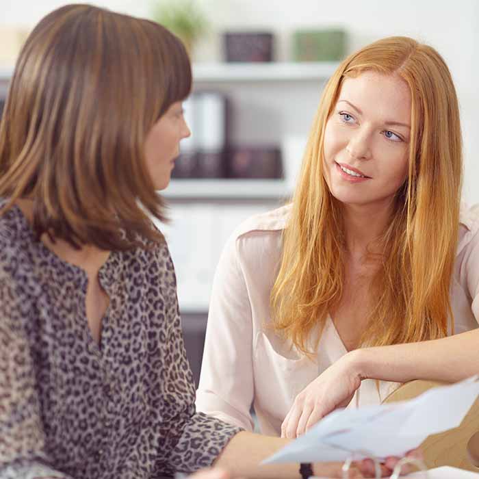 Two women chatting