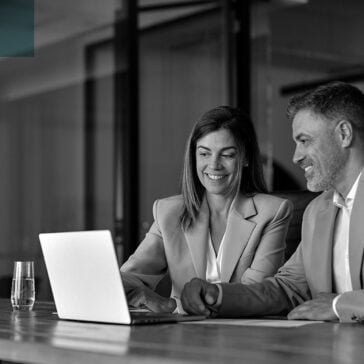 Man and woman in business meeting